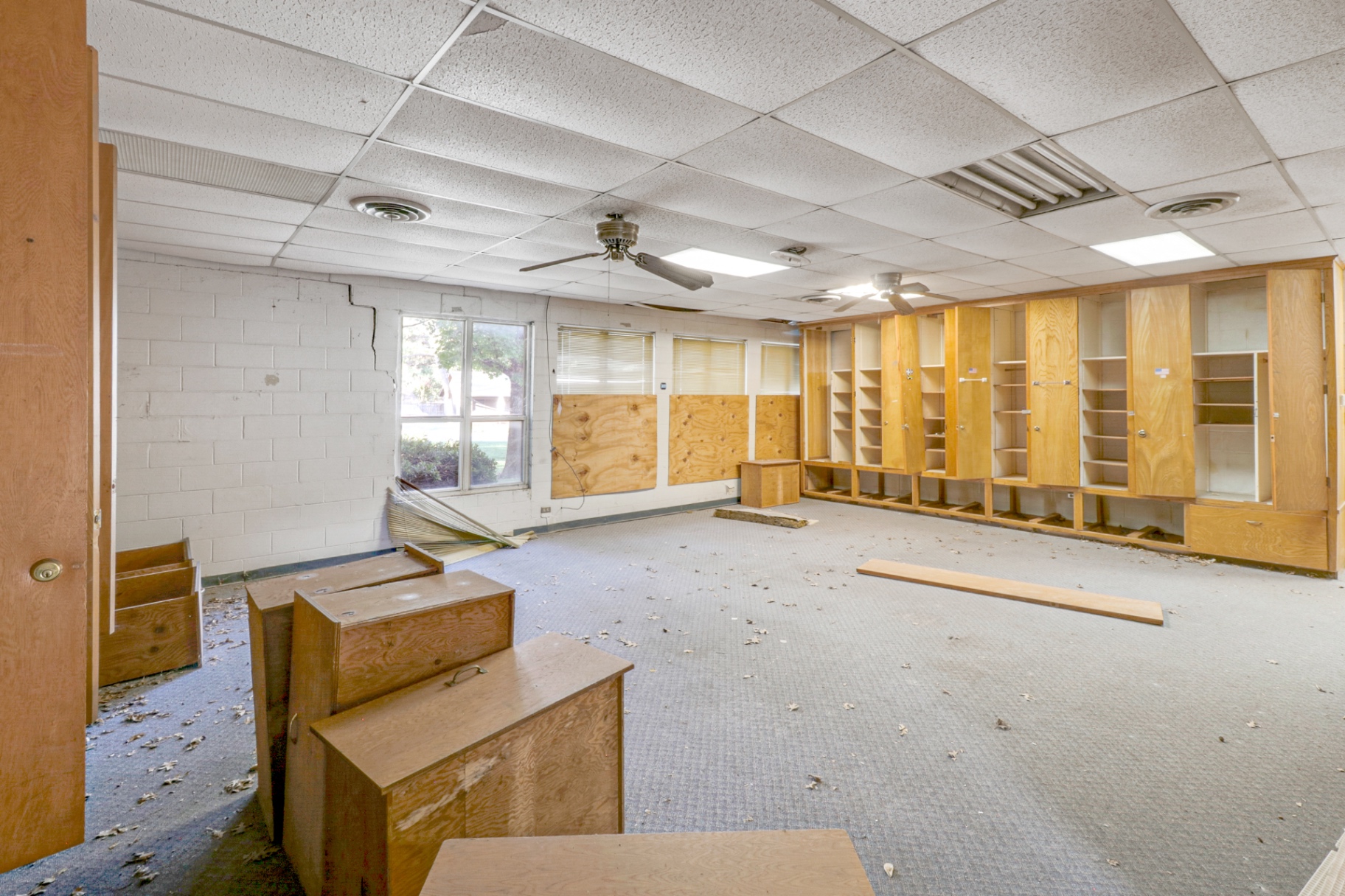 Original office and locker room with built-in millwork